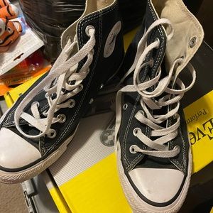 Children’s size 5 black Converse.